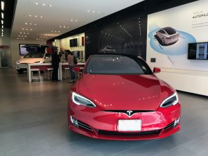 Tesla charges more as share price sparks into life again