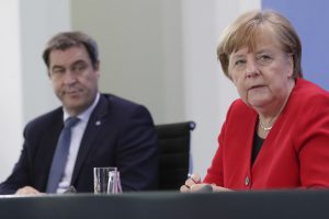 Merkel urges euro integration as judges defend shock ECB ruling