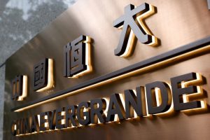 China Officials Play Down Risk of Evergrande Spilling Over