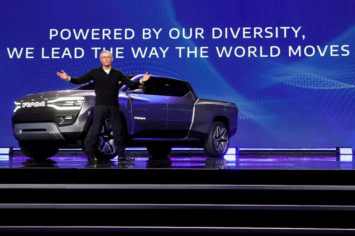 Stellantis CEO Carlos Tavares poses in front of the Ram 1500 Revolution electric concept pickup truck during a Stellantis keynote address at CES 2023, an annual consumer electronics trade show, in Las Vegas, Nevada, US