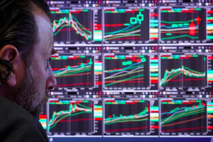 A specialist trader works on the floor of the New York Stock Exchange.