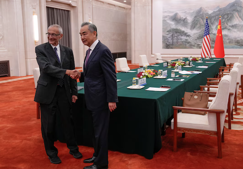 White House Senior Advisor for Clean Energy John Podesta shakes hands with China's Foreign Minister Wang Yi on the day of their meeting at the Great Hall of the People in Beijing, China September 6, 2024. Andy Wong/Pool via REUTERS