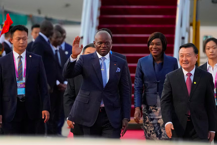 Gabon's President Brice Clotaire Oligui Nguema waves as he arrives at Beijing Airport ahead of the 2024 Summit of the Forum on China-Africa Cooperation (FOCAC) in Beijing, China.