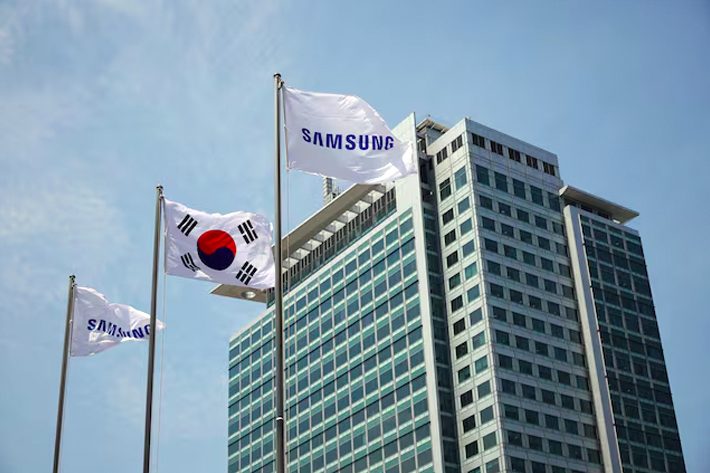 Flags with the logo of Samsung Electronics are seen during a media tour at Samsung Electronics' headquarters in Suwon.