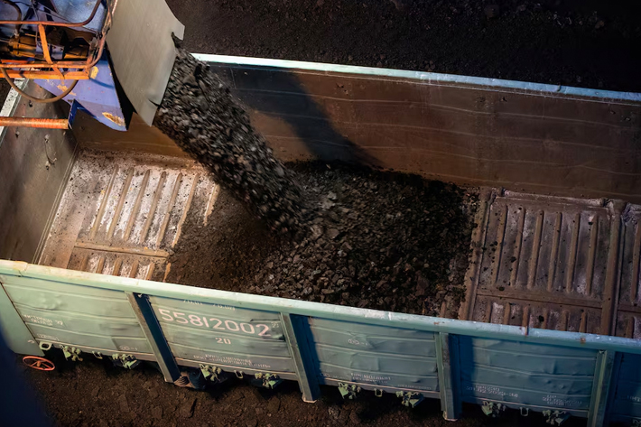 A wagon is loaded with coal at Borodinsky open-pit mine, owned by the Siberian Coal Energy Company (SUEK)