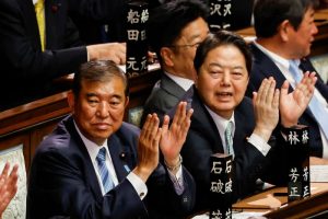 Vote Sees Ishiba Stay as Japan’s PM, Talks With Trump Eyed